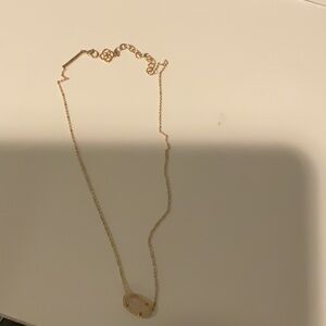 Real Kendra Scott necklace worn once. Brand new condition!